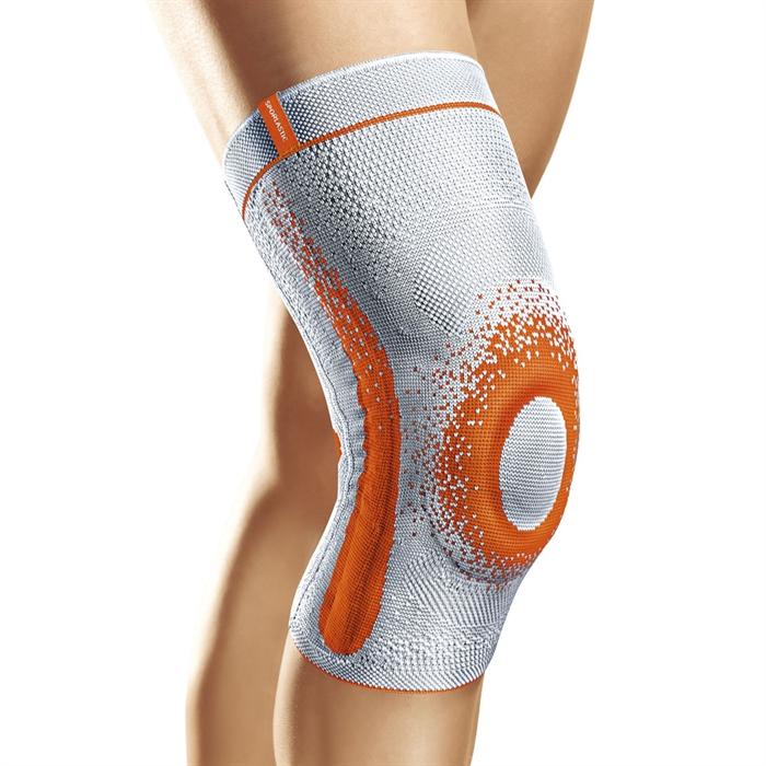 Grå GENU-HiT Supreme knæbandage med orange detaljer og patellapolstring